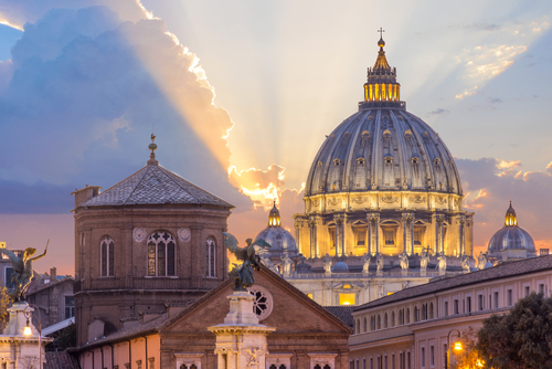 vatican st peters with sun in the background