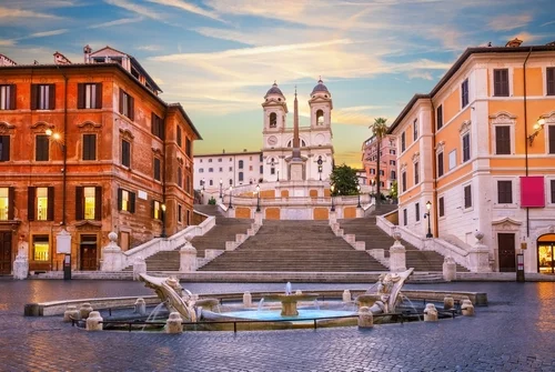the spanish steps in piazza di spagna in rome at dusk