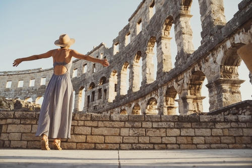 woman visiting the colosseum