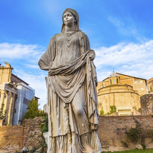 statue in the roman forum of a vestal virgin
